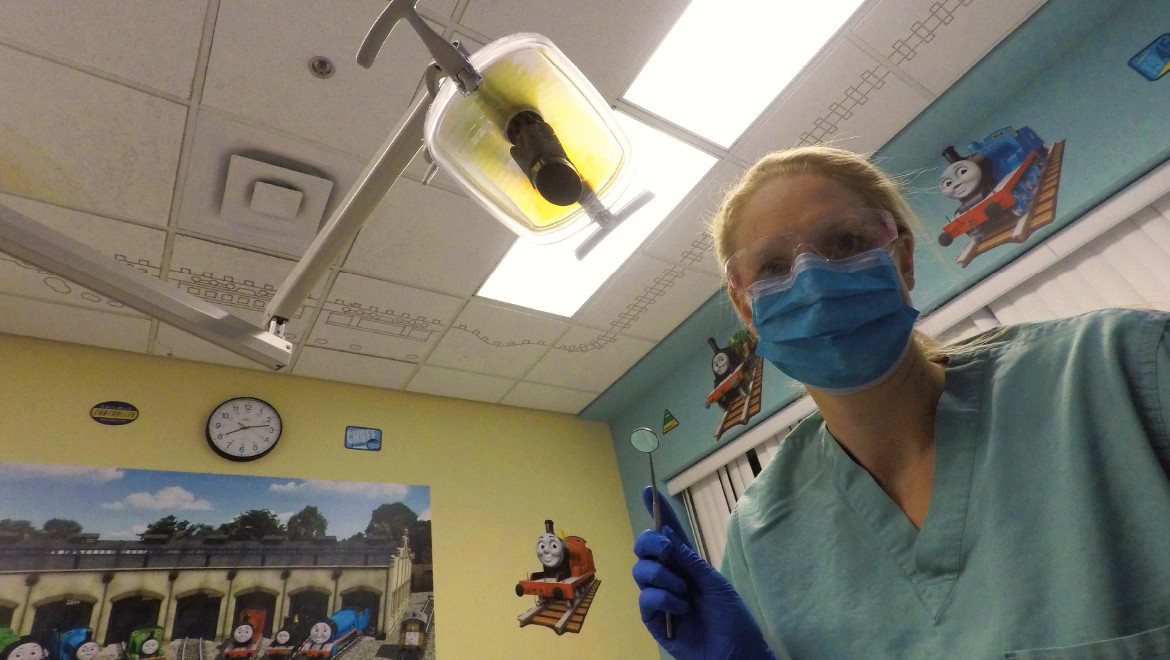 I will sit in a big chair. It will move and lean back. I have to sit still so the dentist can look at my teeth.